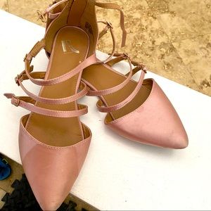 Report pointy toed shoes